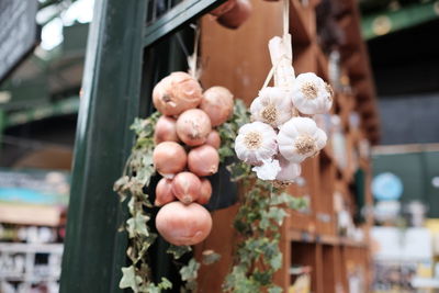 Low angle view of garlic and onions for sale at street market