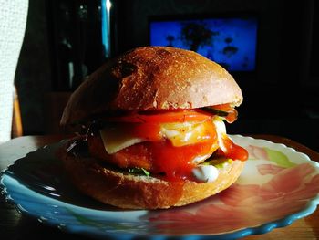 Close-up of burger on table