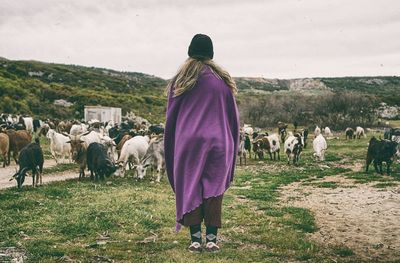 Woman standing on mountain landscape