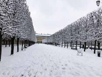 Snow covered landscape against sky