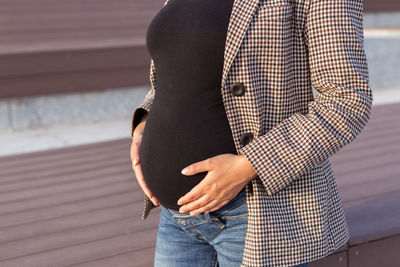 Rear view of couple standing outdoors