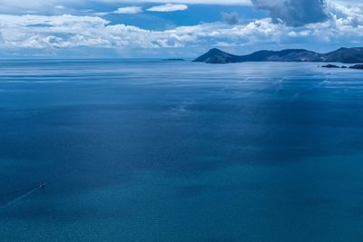 Scenic view of seascape against cloudy sky