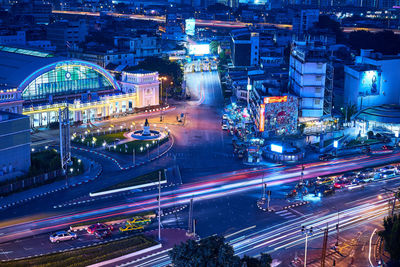 High angle view of illuminated city street at night