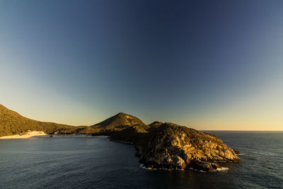 Scenic view of sea against clear sky