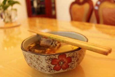 Close-up of noodles in bowl on table