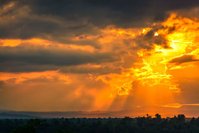 Scenic view of dramatic sky during sunset