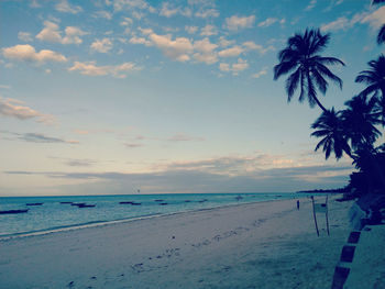 Scenic view of sea against sky at sunset