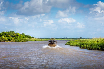 Scenic view of river against sky