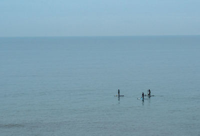 Paddle boarders at westward ho 
