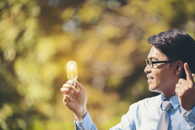 Man holding lighting equipment