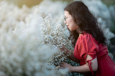 Young woman looking away outdoors