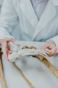 Close-up of man preparing food