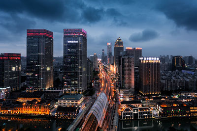 High angle view of cityscape against sky at night