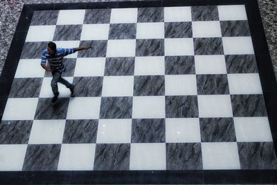 High angle view of full frame shot of chess pieces