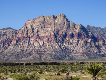 Scenic view of rocky mountains against clear sky