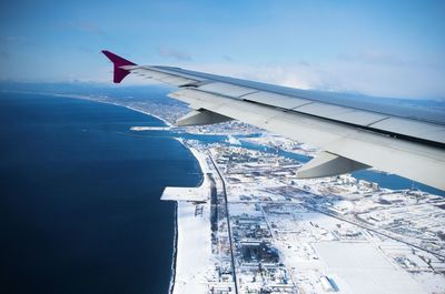 Cropped image of airplane wing