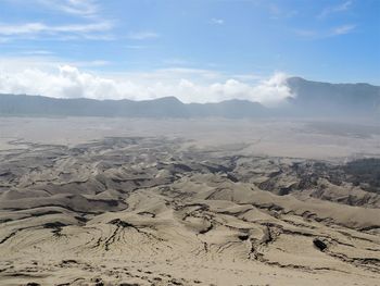 Aerial view of desert against sky