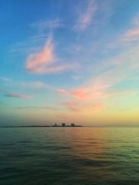 Scenic view of sea against sky at sunset