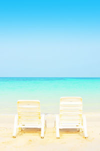 Scenic view of beach against clear sky