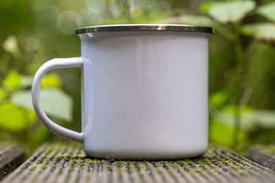 Close-up of coffee cup on table