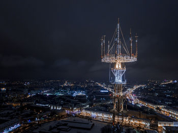 High angle view of illuminated buildings in city at night