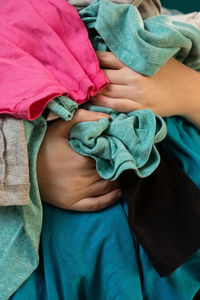 Close-up of baby girl with hands