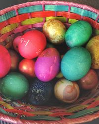 High angle view of multi colored eggs