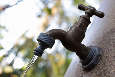 Clear water running from reservoir tank tap