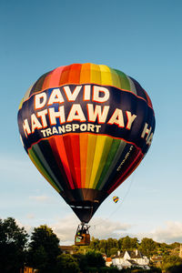 Low angle view of hot air balloon against clear sky