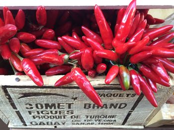 High angle view of red chili peppers for sale at market