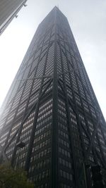 Low angle view of modern building against sky