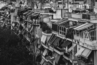 High angle view of buildings by trees