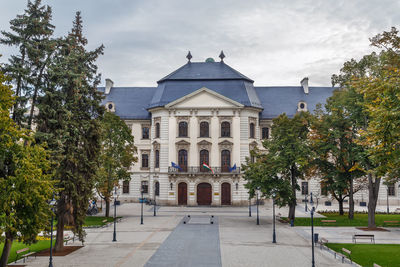 Facade of historic building against sky