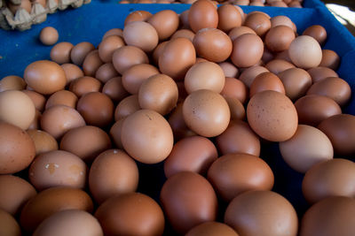 High angle view of eggs in container for sale