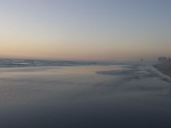 Scenic view of calm sea against sky