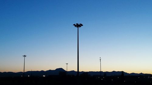 Low angle view of street light against clear sky