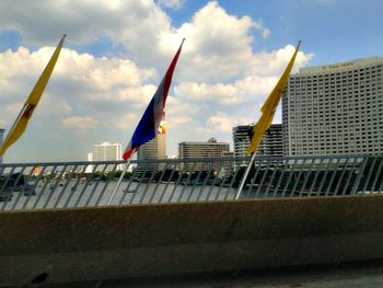 Low angle view of buildings against sky in city