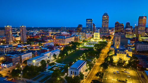 High angle view of illuminated buildings in city