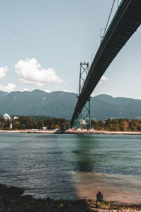 View of bridge over sea against sky