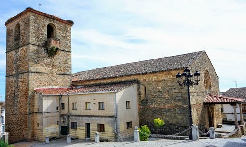 Low angle view of old building against sky