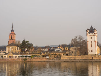 View of buildings against clear sky in city