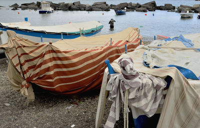 High angle view of boats moored at beach