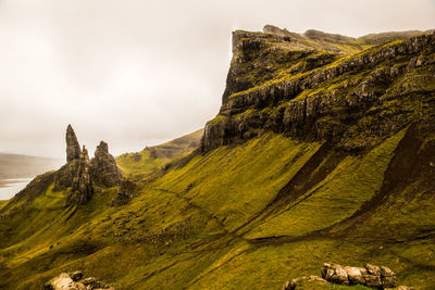 Scenic view of rock formation against sky