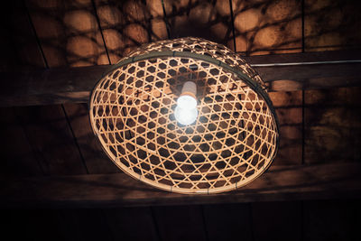 Low angle view of illuminated pendant light