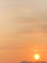 Low angle view of dramatic sky during sunset