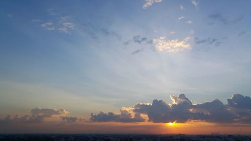 Scenic view of landscape against sky during sunset