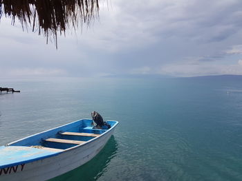 Boat on sea against sky