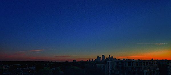 View of cityscape at sunset