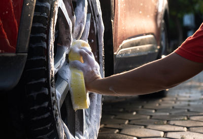 Low section of man working at workshop