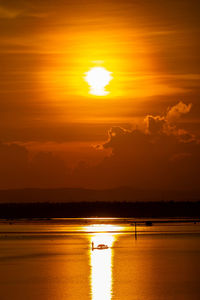 Scenic view of lake during sunset